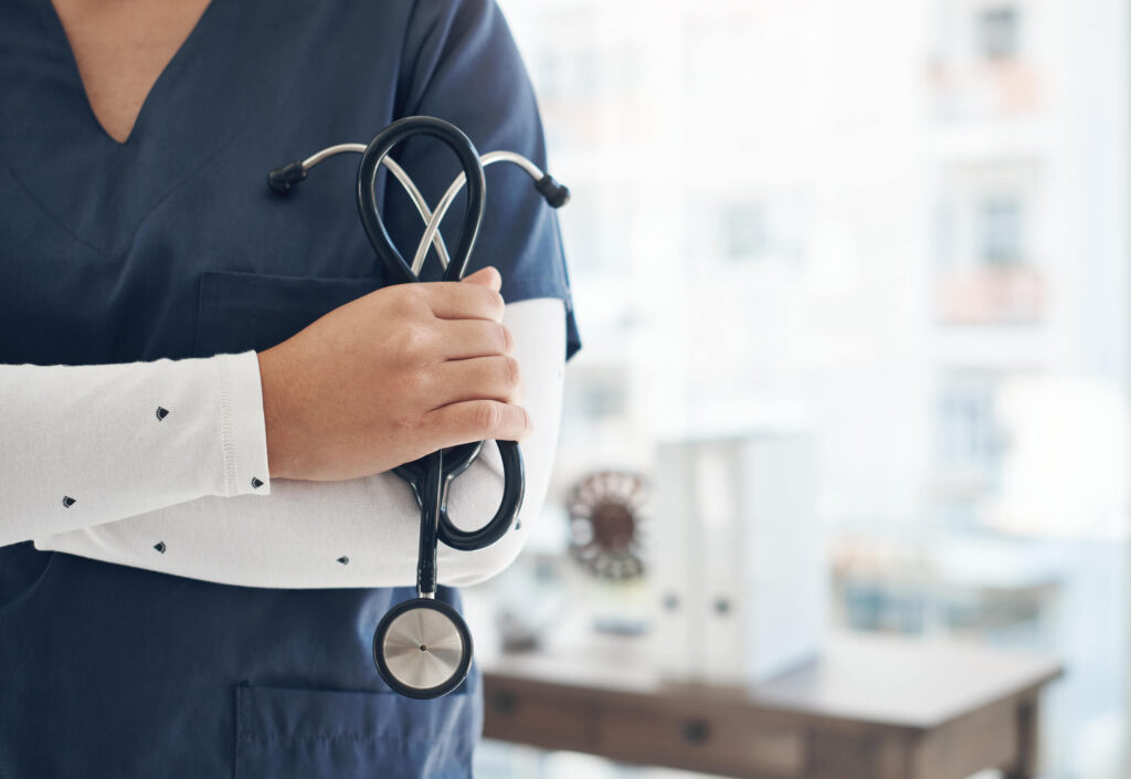 unrecognizable doctor holding stethoscope